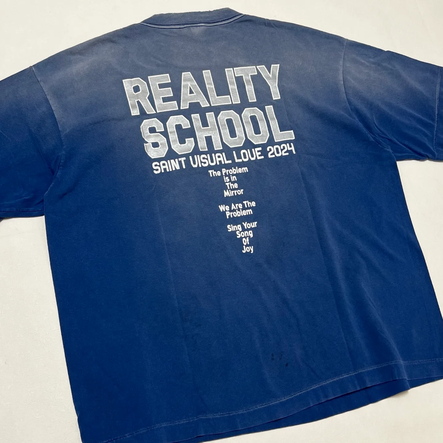 SAINT Mxxxxxx REALITY SCHOOL SS_TEE/NVY slogan distressed short-sleeves, washed blue S-XL, garment dyeing, horse fade, ultra-complex shearing and destruction treatment, correct version, cylindrical fabric, customized original consistent main mark/wash mark, original consistent silver powder printing, distressed treatment